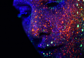 Neon face paint splatter